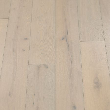 Glacier Plank: Detailed view of Jordan's Woodflooring in Glacier, featuring cool, icy tones with a smooth, pristine surface.