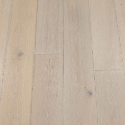 Granite Plank Flooring: A close-up view of granite-inspired plank flooring, featuring speckled gray tones and a textured surface, ideal for creating an industrial-chic look.