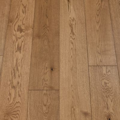Prune Plank: A close-up of Jordan's Woodflooring in Prune, highlighting rich, dark purple-brown tones with a natural wood grain, offering a unique and luxurious look.