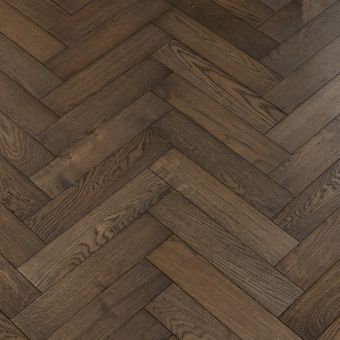 Resized Small Herringbone Black Olive Flooring: Jordan's Woodflooring herringbone pattern flooring in black olive, featuring a dark and sophisticated look.