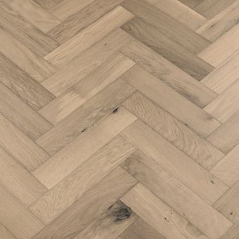 Resized Small Herring Iron: Iron-coloured small herringbone pattern flooring from Jordan Wood Floors, with a cool and metallic grey tone.