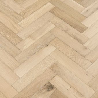 A close-up image of small herringbone flooring in a linen finish. The flooring showcases a soft, off-white colour with subtle variations, ideal for creating a light and airy feel.