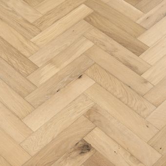 Resized Small Herring Marine: Marine-coloured small herringbone pattern flooring from Jordan Wood Floors, with a deep and serene blue-green hue.