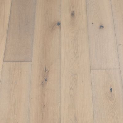 An image of shale plank flooring. The planks exhibit a dark grey colour with natural wood grain textures, offering a sleek and contemporary appearance.