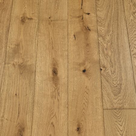An image showing plank-style wood flooring with a deep, smoked brown finish. The rich colour and pronounced wood grains lend a rustic and warm appearance.