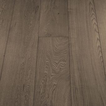 A product image of Wide Nordic plank flooring by Jordan Wood Floors, characterized by light, ashy tones with subtle wood grain details, ideal for a Scandinavian-inspired interior.