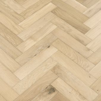 Pebble Herringbone Flooring: A view of pebble-colored herringbone patterned flooring, with soft gray tones resembling smooth river pebbles, adding a natural and earthy element to interior designs.
