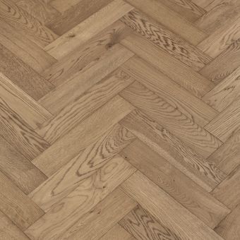 Slate Herringbone Flooring: A close-up view of slate-coloured herringbone patterned flooring, featuring deep gray tones reminiscent of natural slate stone, adding a modern and sleek aesthetic to interiors.