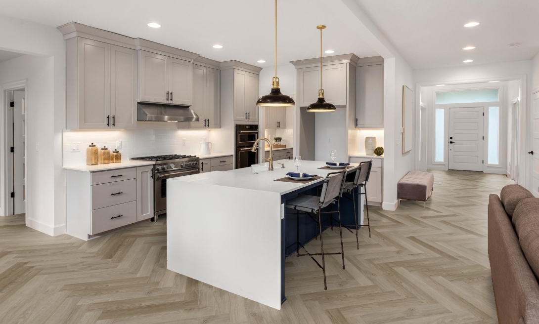 Editions Herringbone H10 Sandringham Rock - A sample of Sandringham Rock Editions Herringbone wood flooring, measuring 1090 x 656 pixels, with a natural stone-inspired pattern.